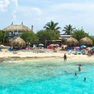 Enjoy a lively getaway with our boat rental for small groups to Klein Curacao—swim, relax on sandy beaches with colorful umbrellas and palm trees. Local rate per person is just 135.- ANG! Book your adventure today under the tropical blue sky.