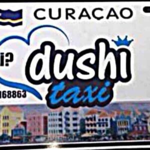 The "Taxi to L'aldea" sign from Curaçao says, "Need a Taxi? dushi taxi," with a heart graphic. Contact via WhatsApp at +0059995168863. Features the Curaçao flag, Quick Chip logo, Facebook icon, and Willemstad's colorful waterfront.