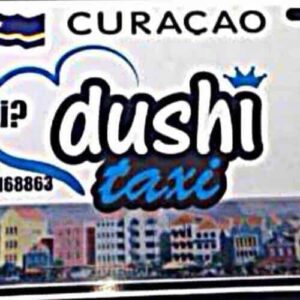 A Curacao taxi sign for "Taxi to Otrobanda" features "Need a Taxi? dushi taxi," a WhatsApp phone number, the Curacao flag, Dutch colonial building images, and local taxi logos on the right.