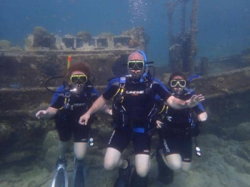 Discover the Magic of Night Diving at Tugboat Beach